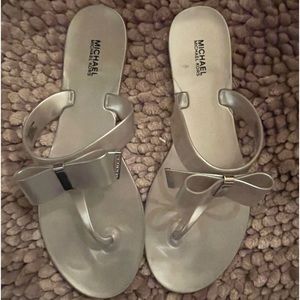 Michael Kors jelly sandals with a bow. Silver. Size 9.